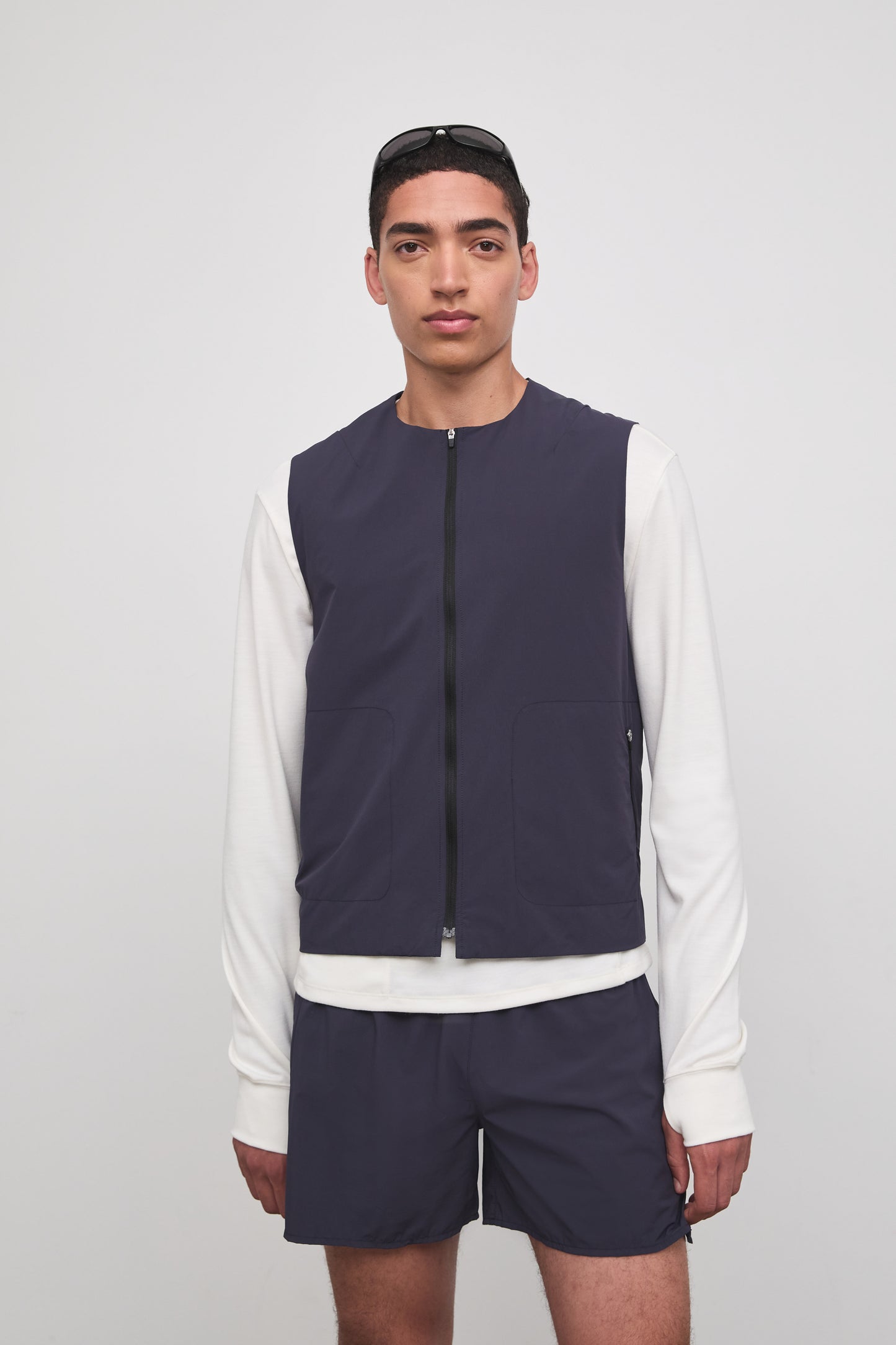 Literary Sport | Cesaire Mens Lightweight Insulated Running Vest - Washed Navy - Front