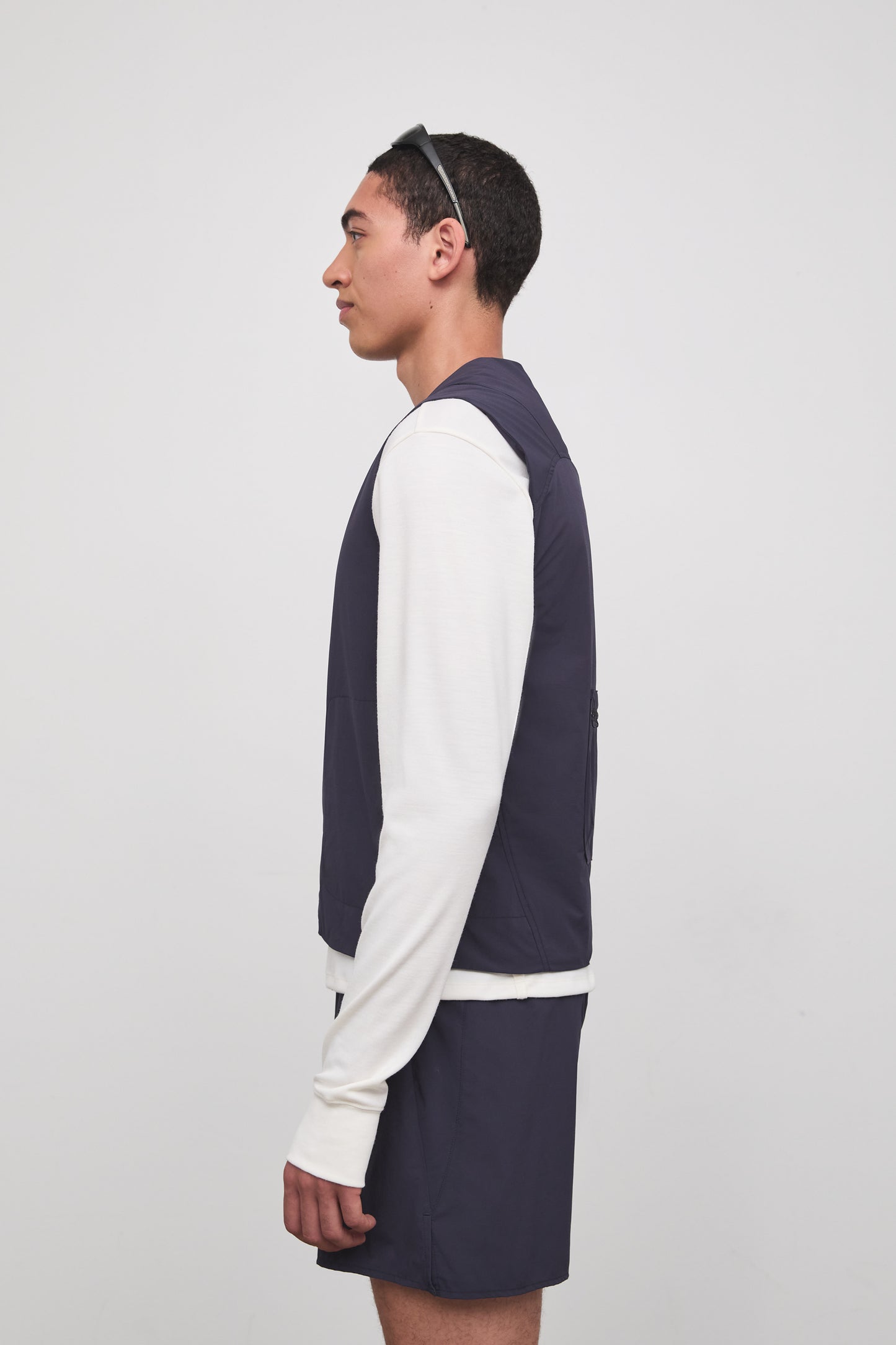 Literary Sport | Cesaire Mens Lightweight Insulated Running Vest - Washed Navy - Side