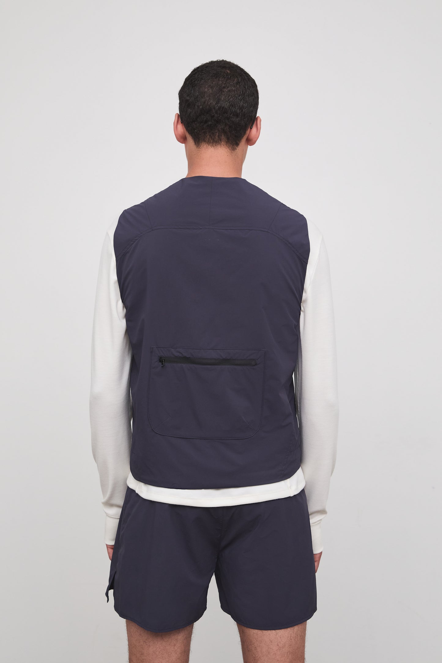 Literary Sport | Cesaire Mens Lightweight Insulated Running Vest - Washed Navy - Back