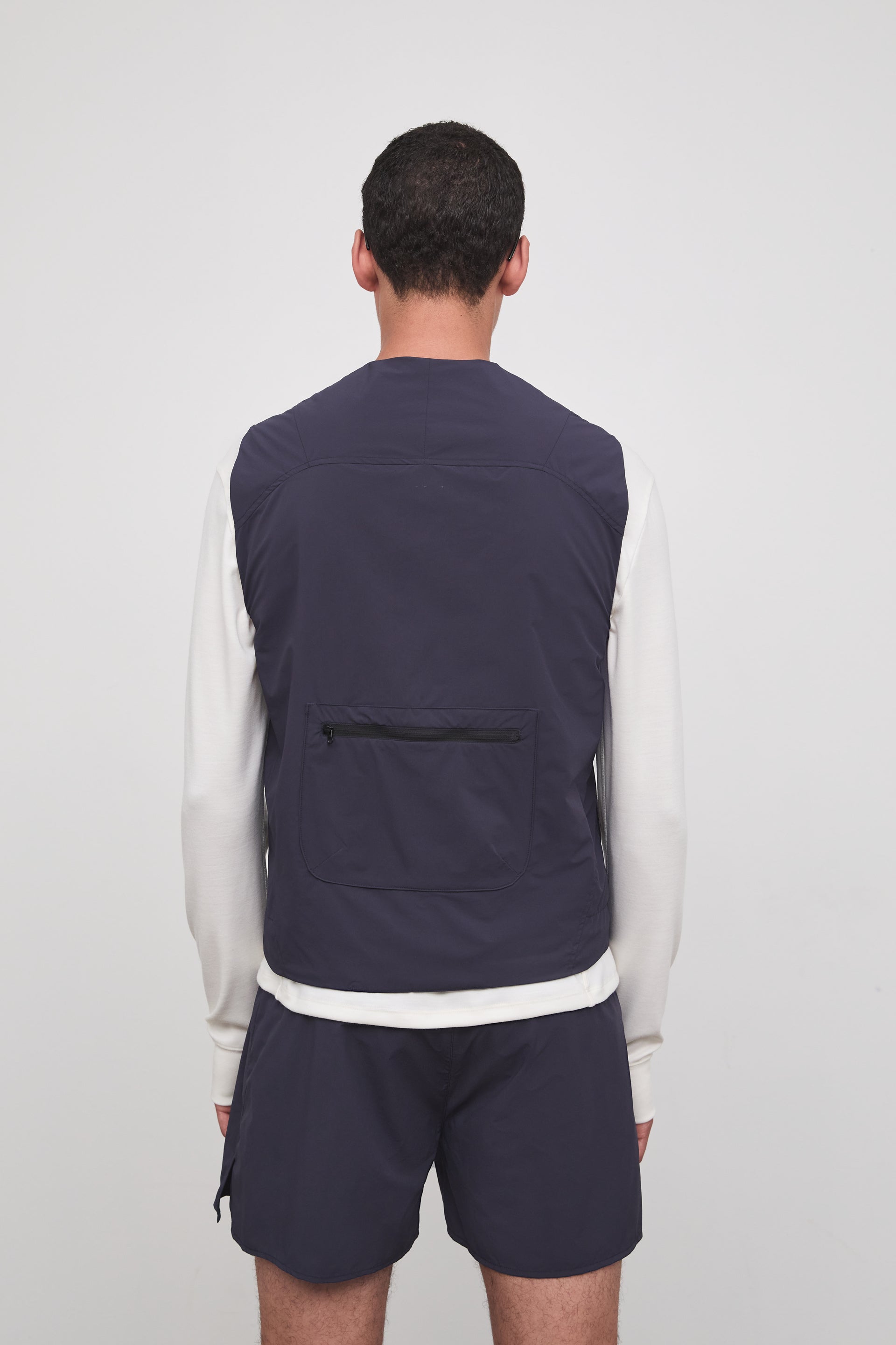 Literary Sport | Cesaire Mens Lightweight Insulated Running Vest - Washed Navy - Back