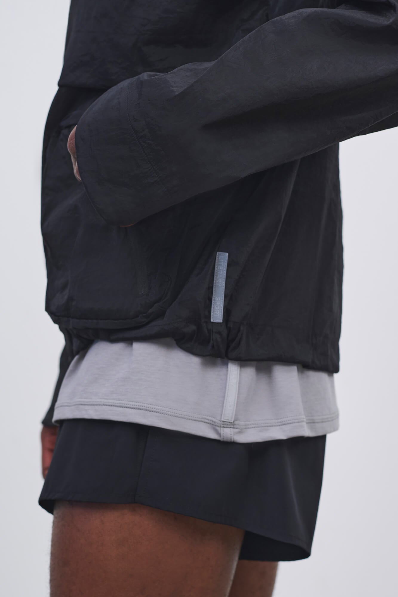 Literary Sport - Ashbery Mens Packable Running Jacket in Crinkle Nylon - Black